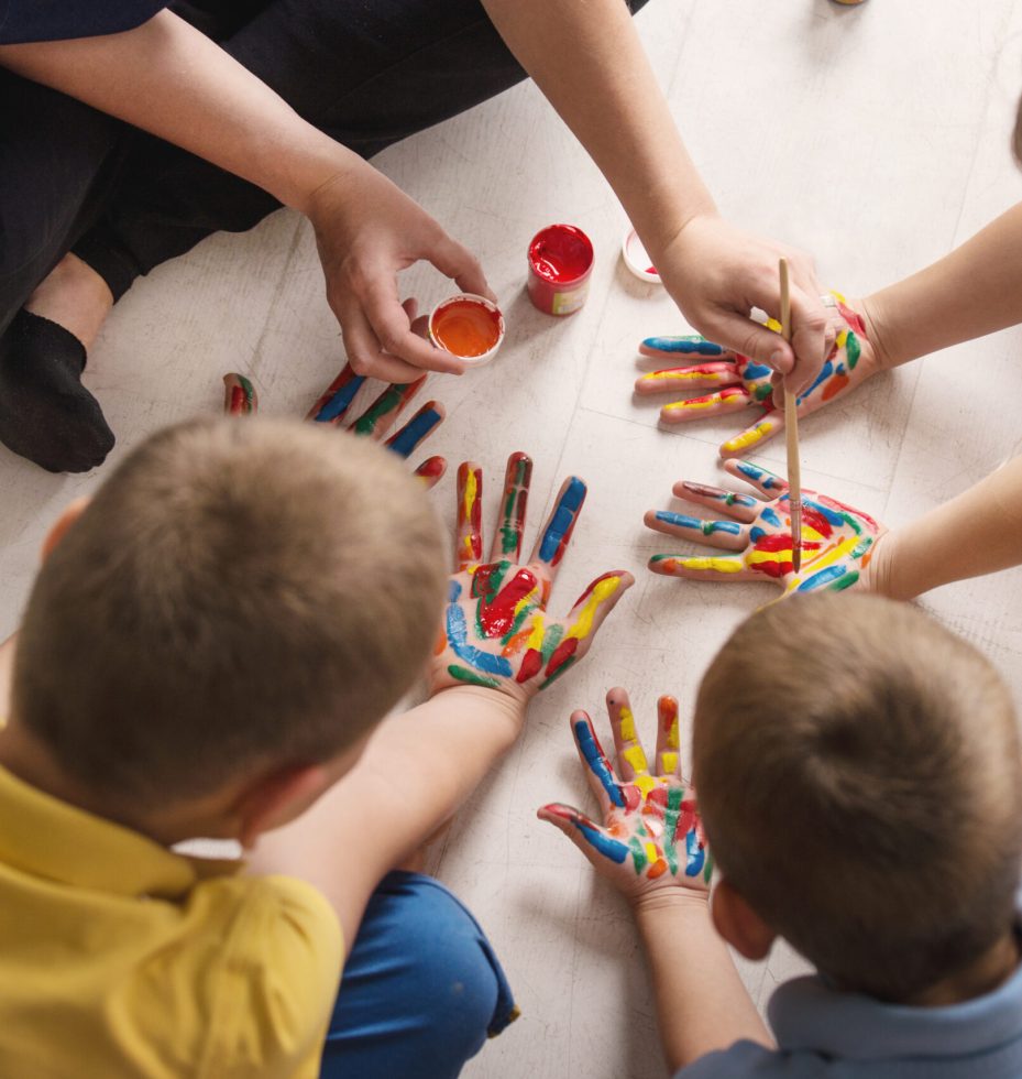 teacher works with children according to the Montessori method a teacher works with children according to the Montessori method a